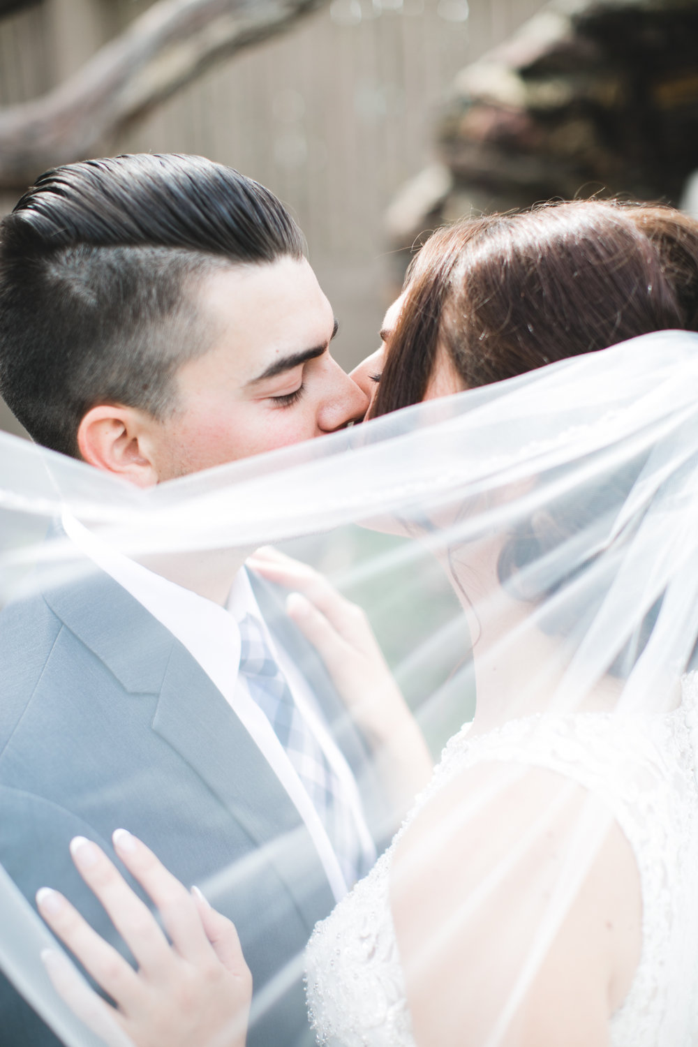 This year, I really loved playing with veil details in photos. It wasn't easy and it took me at least 10 shots to find this perfect one but it was absolutely worth it. Also, Stephanie + Aaron were one of my first couples this year and they really couldn't have started it off any better for me.